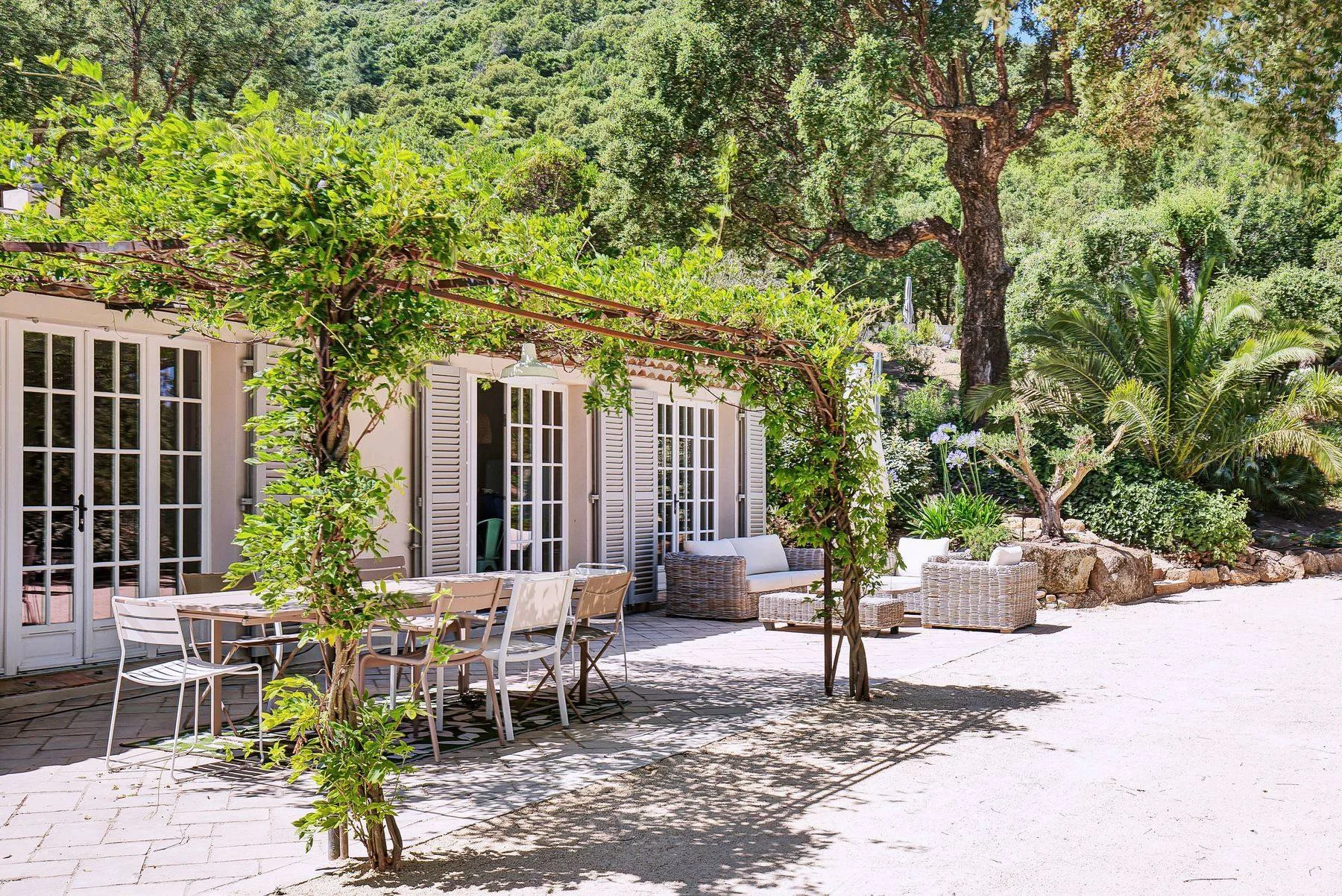 Bastide terrace beneath the vine arbour